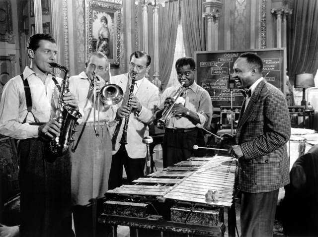 《一首歌的誕生》宣傳劇照，由左至右分別為Charlie Barnet、Tommy Dorsey、Benny Goodman、Louis Armstrong、Lionel Hampton。